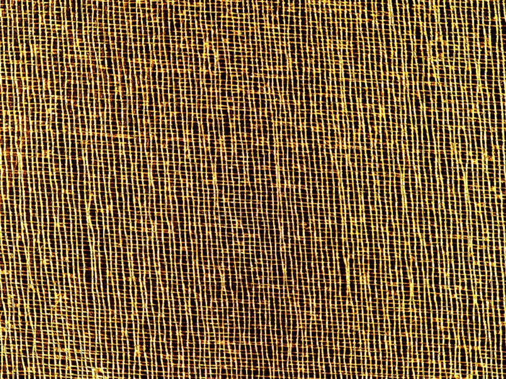 Texture Jigsaw Puzzle featuring the photograph Closeup Of Golden Organza Macro Mesh Texture by Severija Kirilovaite