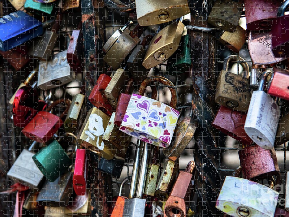 Attached Jigsaw Puzzle featuring the photograph Colorful Love Padlocks Attached On Iron Fence by Andreas Berthold