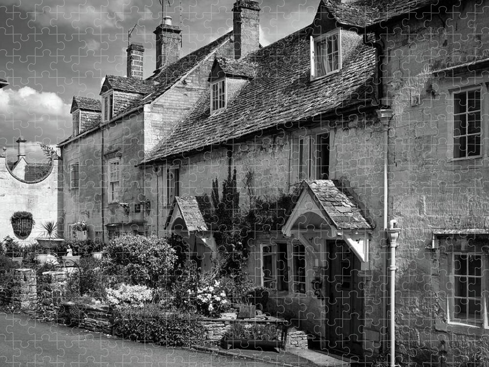 Britain Jigsaw Puzzle featuring the photograph Cotswold stone houses line the streets in Painswick by Seeables Visual Arts