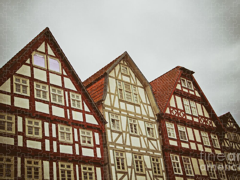 Architecture Jigsaw Puzzle featuring the photograph Cute historical half-timbered houses in Melsungen, Germany by Mendelex Photography