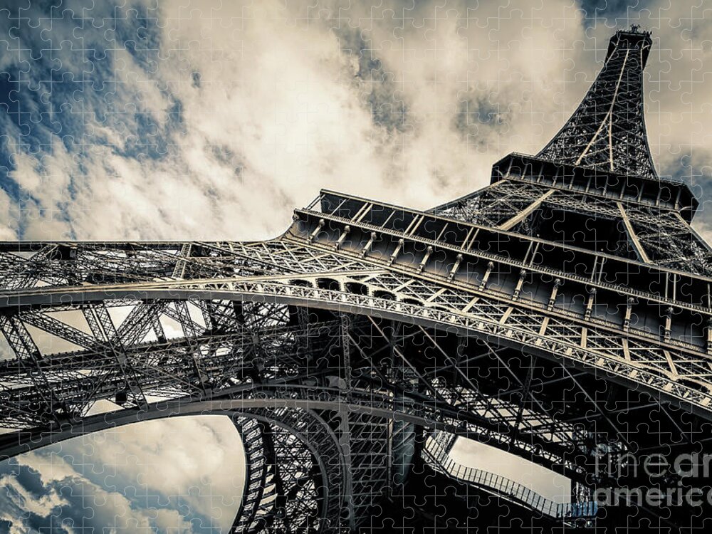 Eiffel Tower Jigsaw Puzzle featuring the photograph Eiffel Tower with blue sky and cloud background. Low angle view by Jane Rix