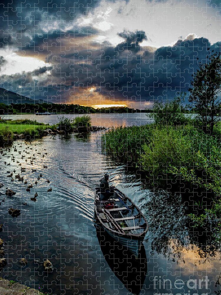 Ireland Jigsaw Puzzle featuring the photograph Fisher boat returns at sunset from Lough Leane in Killarney National Park in Ireland by Andreas Berthold