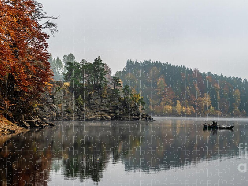 Austria Jigsaw Puzzle featuring the photograph Foggy Landscape With Fishermans Boat On Calm Lake And Autumnal Forest At Lake Ottenstein In Austria by Andreas Berthold