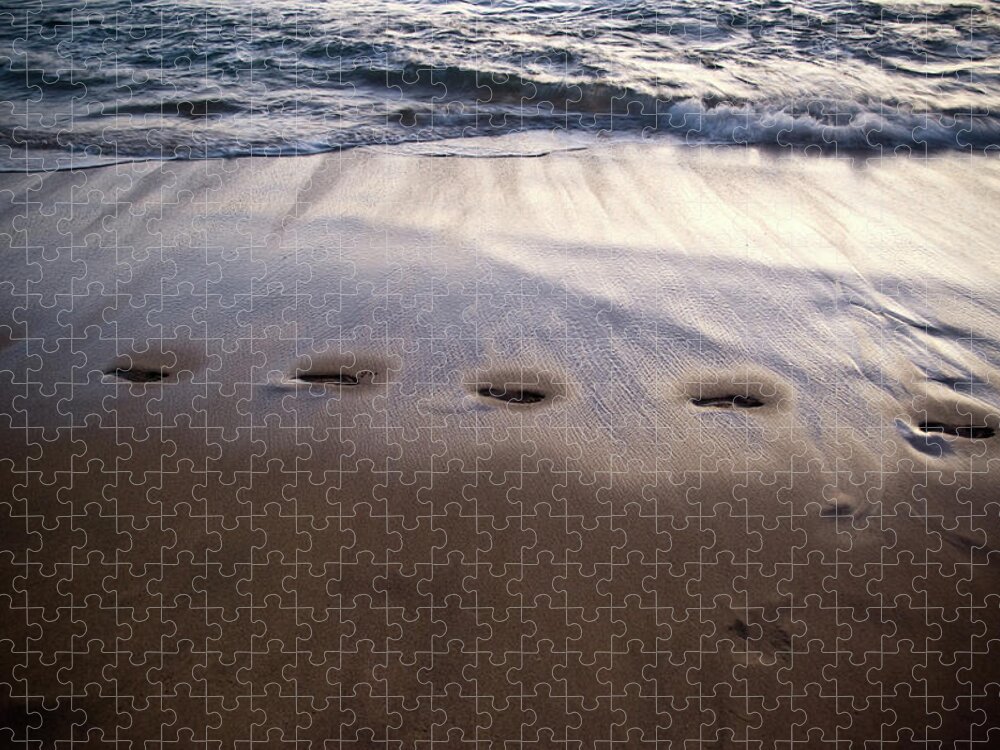 Footprints Jigsaw Puzzle featuring the photograph Footprints by Naomi Maya