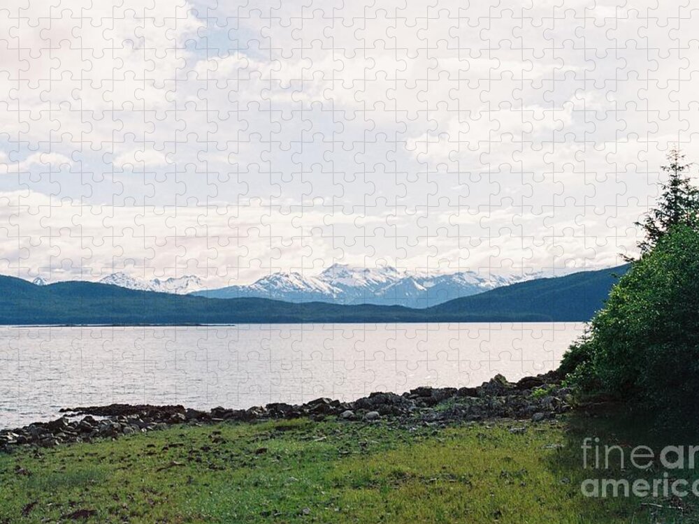 #alaska #ak #juneau #cruise #tours #vacation #peaceful #sealaska #southeastalaska #calm #chilkatmountains #chilkats #capitalcity #lynncanal #shrineofsttherese #clouds #cloudy #35mm #analog #film #spring #sprucewoodstudios Jigsaw Puzzle featuring the photograph Green Spring by Lynn Canal by Charles Vice