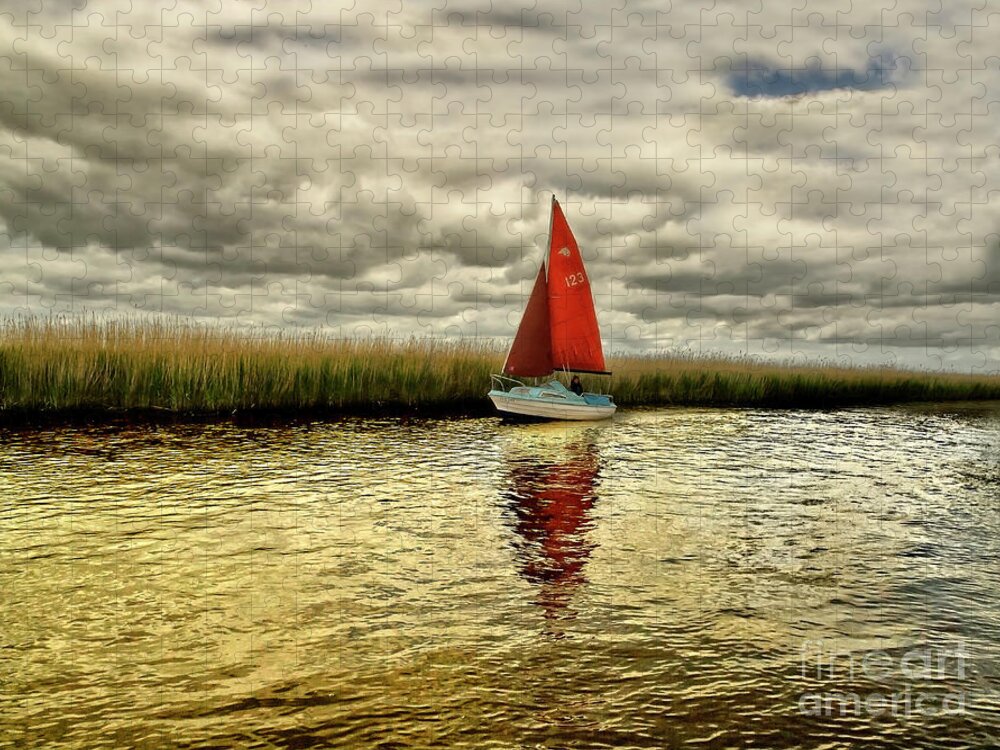 Red Blue Gold Yellow Sail Water Sailor Sailing Calm Beautiful Lake River Reeds Happy Joy Joyful Solo Single Alone Relaxing Romantic Atmospheric Solitude Clouds Colorful Color Boat Reflections Serene Solitary Tranquil Tranquillity Elements Vibrant Timeless Still Calmness Peaceful Breathtaking Mind-blowing Nature Bright Vivid Golden Patterns Surf Way Charming Relaxation Painterly Magical Sunset Dawn Delightful Serenity Cheerful Jolly Awesome Allure Seascape Simplicity Minimalism Loneliness Poetic Jigsaw Puzzle featuring the photograph Hundred shades of GOLD - RED SAIL IN GOLD WATERS by Tatiana Bogracheva