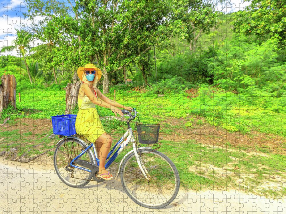 Covid 19 Jigsaw Puzzle featuring the photograph La Digue biking in Covid 19 time by Benny Marty