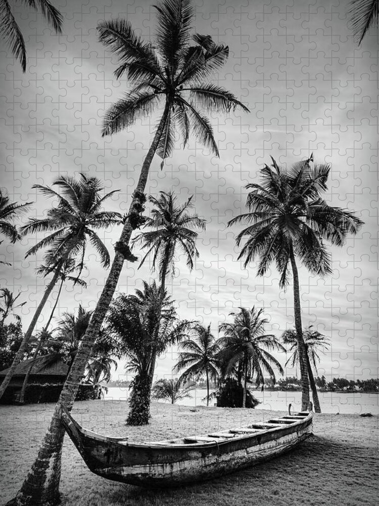 Black Jigsaw Puzzle featuring the photograph Old Canoe Under the Palms Black and White by Debra and Dave Vanderlaan