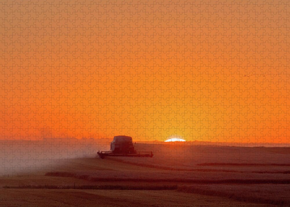Nd Jigsaw Puzzle featuring the photograph On Fields of Gold - Combine at sunset in a ND wheat field by Peter Herman