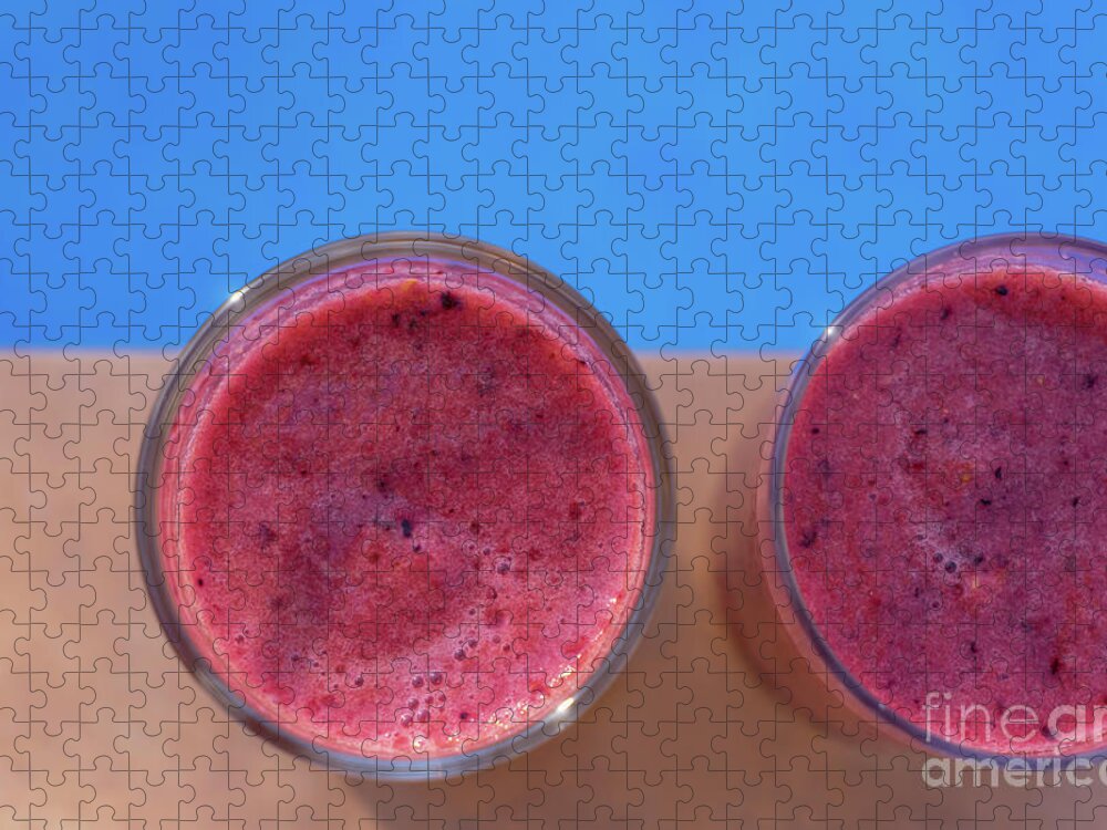 Drink Jigsaw Puzzle featuring the photograph Pink fruit smoothies by the beautiful blue pool by Adriana Mueller
