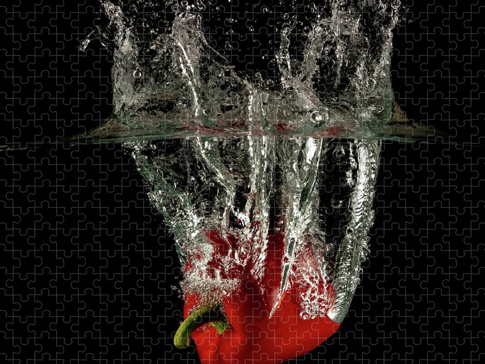 Pepper Jigsaw Puzzle featuring the photograph Red bell pepper dropped and slashing on water by Michalakis Ppalis