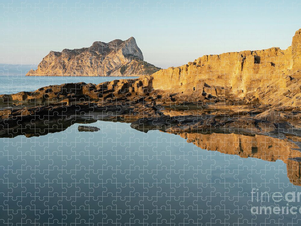 Mediterranean Jigsaw Puzzle featuring the photograph Reflection of rocks in the calm Mediterranean Sea at sunrise 2 by Adriana Mueller