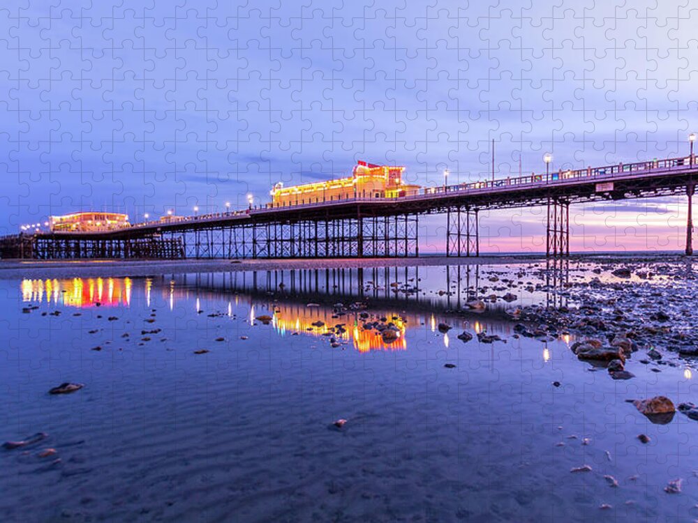Beach Jigsaw Puzzle featuring the photograph Reflection of the pier at sunset by Andrew Lalchan