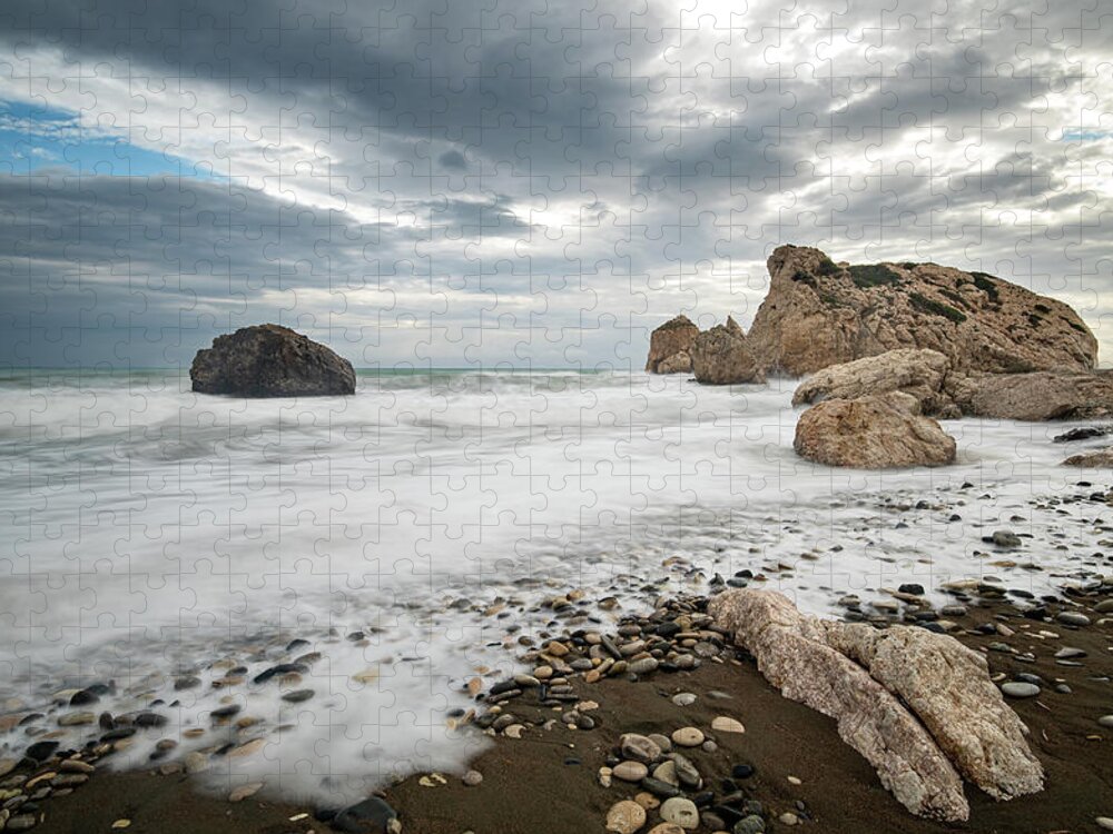 Seascape Jigsaw Puzzle featuring the photograph Seascape with windy waves splashing at the rocky coastal area. by Michalakis Ppalis