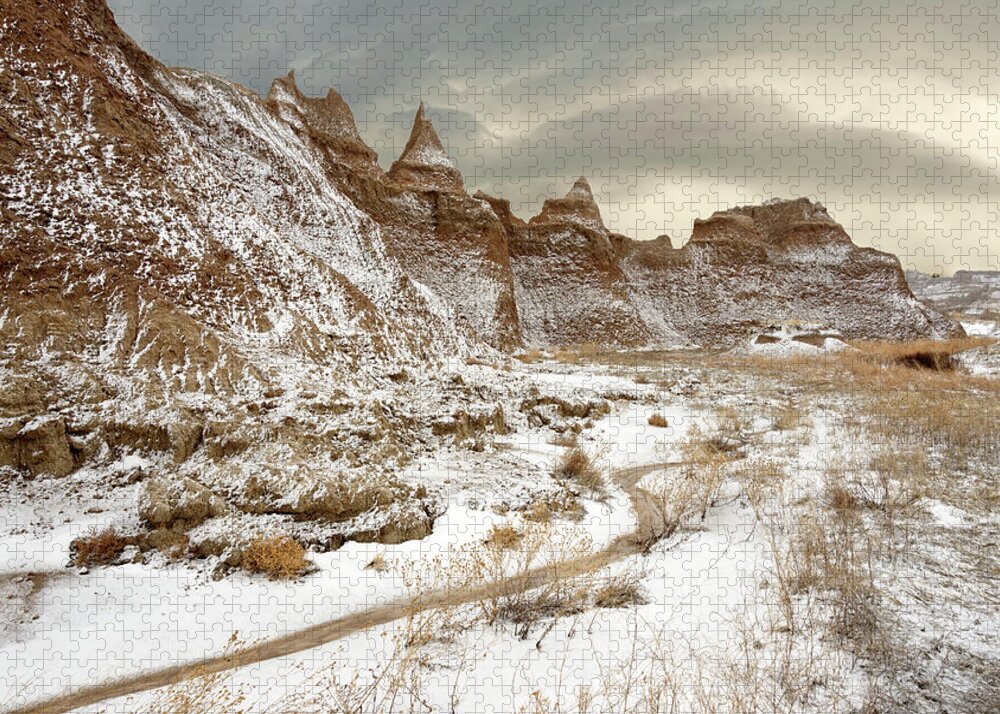 Badlands Jigsaw Puzzle featuring the photograph South Dakota Badlands National Park in early Spring by Peter Herman
