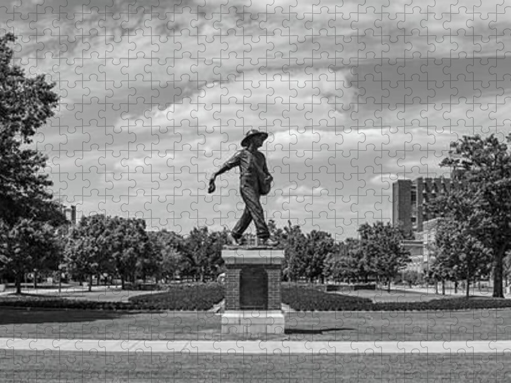 Sower Statue Jigsaw Puzzle featuring the photograph Sower Statue on the campus of the University of Oklahoma in panoramic black and white by Eldon McGraw