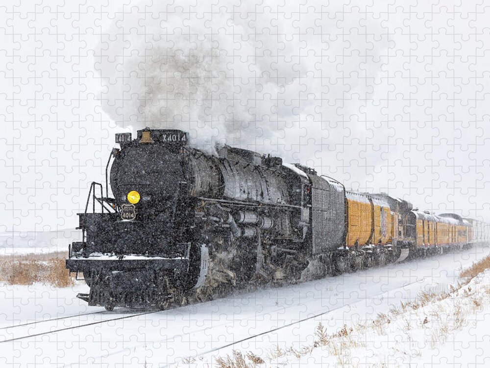 Train Jigsaw Puzzle featuring the photograph Steam Engine Races Through a Snowstorm by Tony Hake
