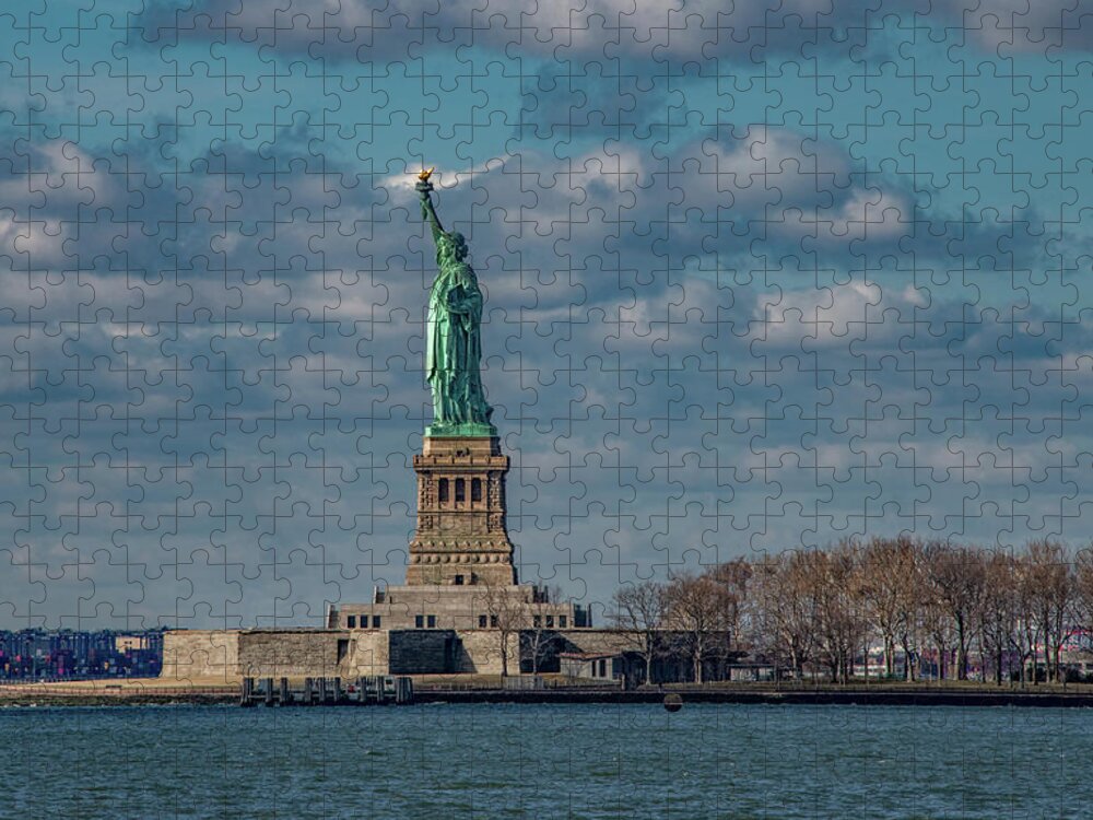 Nyc Jigsaw Puzzle featuring the photograph Still She Stands Shining In The Harbor by Marcy Wielfaert