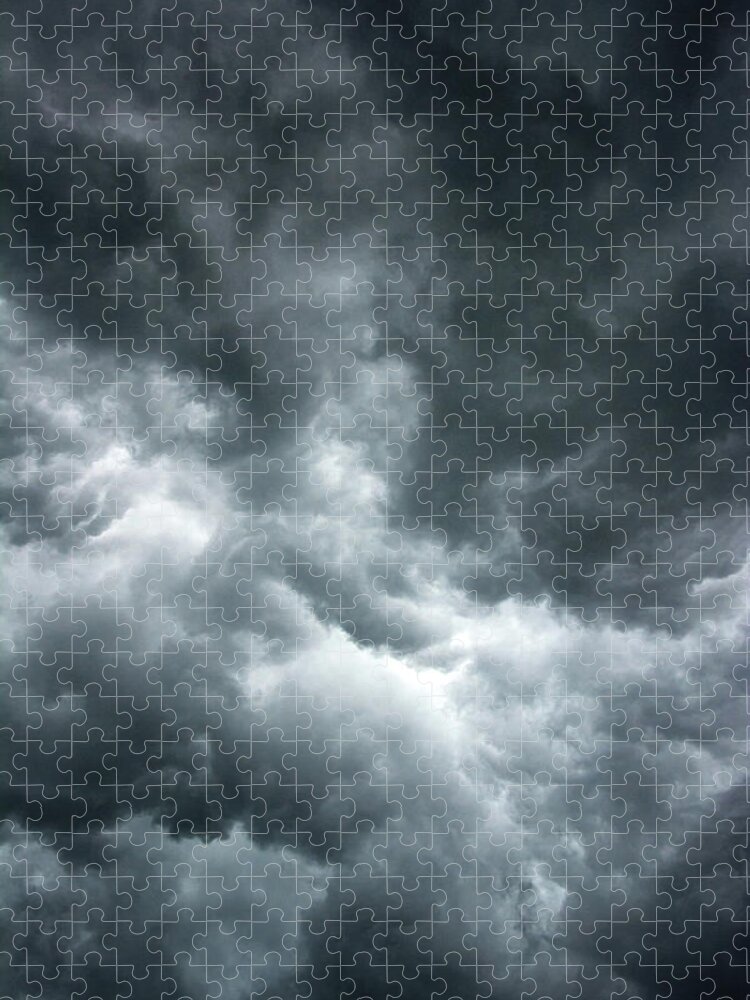 Clouds Jigsaw Puzzle featuring the photograph Stormy clouds in the sky. by Bernhard Schaffer