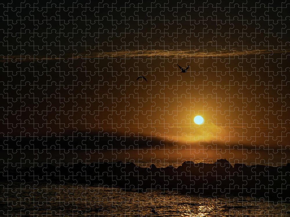 Sunset Jigsaw Puzzle featuring the photograph Sunset over the ocean by Micah Offman