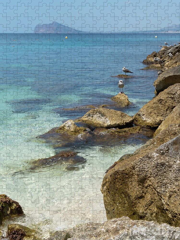 Mediterranean Jigsaw Puzzle featuring the photograph Turquoise blue sea water and rocks in Calpe 2 by Adriana Mueller