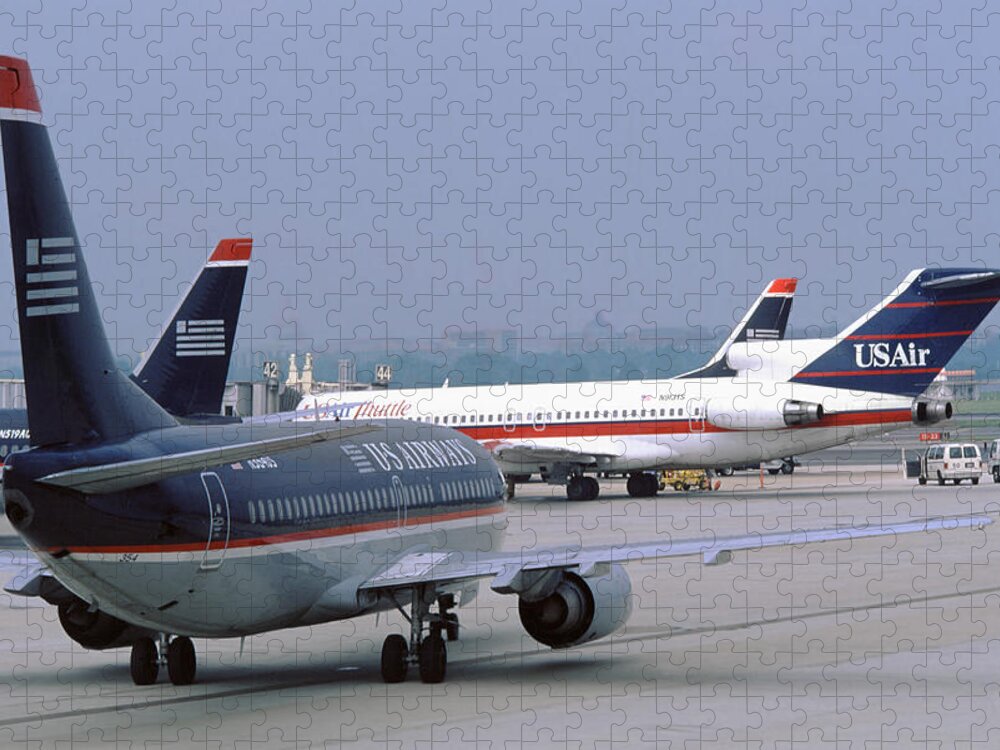 Us Airways Jigsaw Puzzle featuring the photograph US Airways Boeing 737s at Washington Reagan Airport by Erik Simonsen