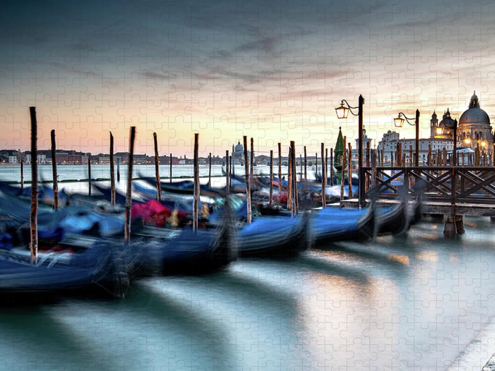 Gondola Jigsaw Puzzle featuring the photograph Venice Gondolas moored at the San Marco square. by Michalakis Ppalis
