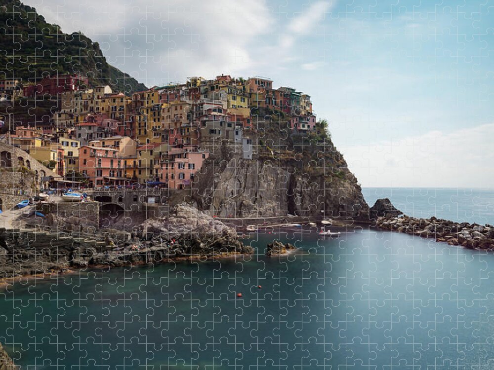 Cinque Terre Jigsaw Puzzle featuring the photograph Village of Manarola with colourful houses at the edge of the cliff Riomaggiore, Cinque Terre, Liguria, Italy by Michalakis Ppalis