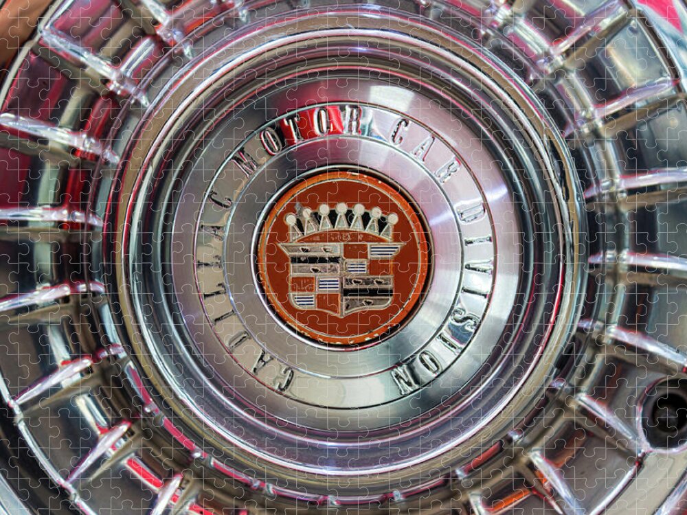Cadillac Jigsaw Puzzle featuring the photograph Vintage Cadillac De Ville Convertible 1967 wheel with emblem by Viktor Wallon-Hars