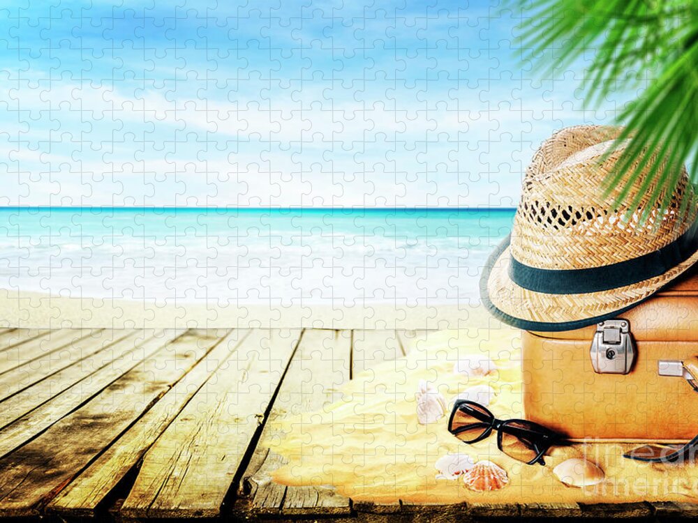 Summer Jigsaw Puzzle featuring the photograph Vintage suticase, sunglasses and hipster hat on sand by Jelena Jovanovic