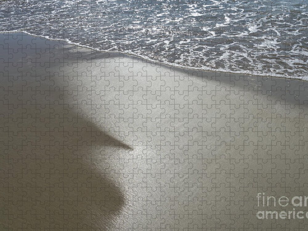 Sandy Beach Jigsaw Puzzle featuring the photograph Wet sand, sea water and reflections of sunlight by Adriana Mueller