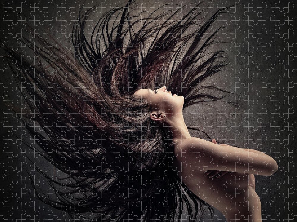 Hair Jigsaw Puzzle featuring the photograph Woman waving long dark hair by Johan Swanepoel