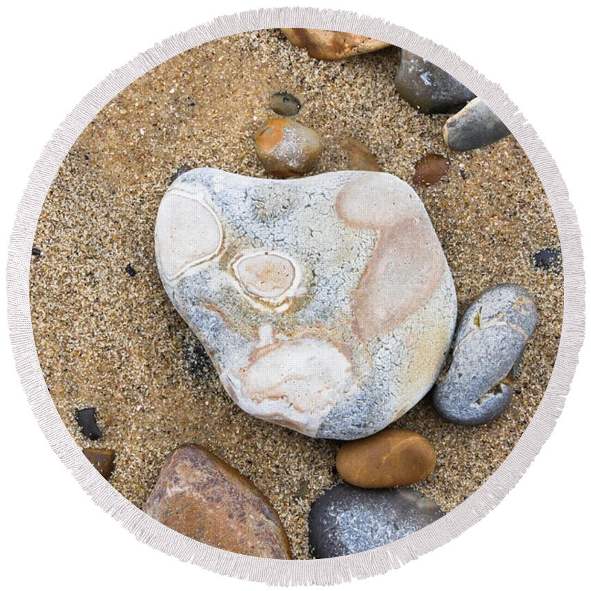Age Round Beach Towel featuring the photograph Beach pebbles #1 by Tom Gowanlock