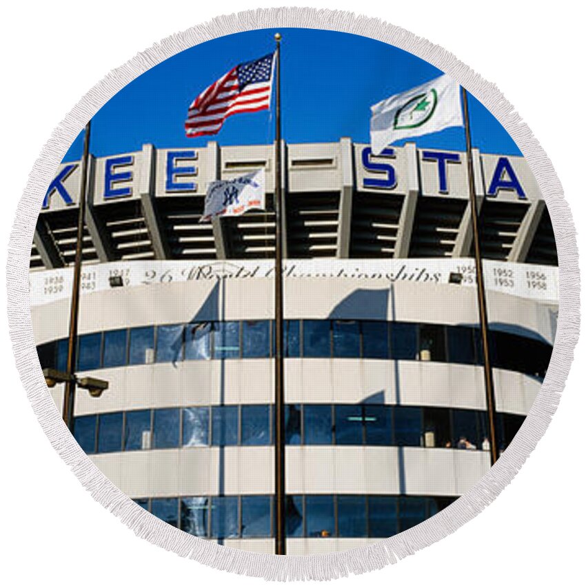 Photography Round Beach Towel featuring the photograph Flags In Front Of A Stadium, Yankee #1 by Panoramic Images