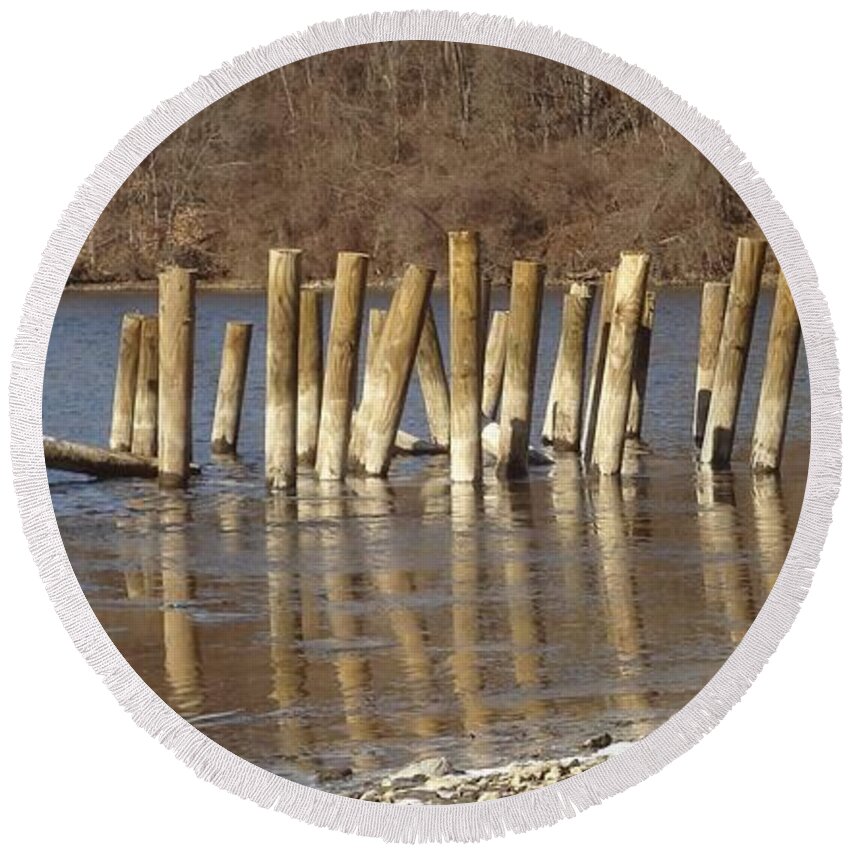 Water Round Beach Towel featuring the photograph Frozen pilings #1 by Michael Porchik