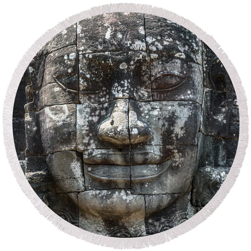 Buddha Round Beach Towel featuring the photograph Giant Buddha face inside Bayon temple - Angkor wat -Cambodia #1 by Matteo Colombo