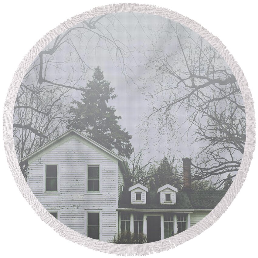 Home; House; Old; Farmhouse; Spooky; Peeling Paint; Derelict; Neglected; Sidewalk; Creepy; Dark; Entrance; Stairs; Door; Haunted; Porch; Eerie; Scary; Ruin; Mood; Gloomy; Rural; Fog; Trees; Dead; Fall; Autumn Round Beach Towel featuring the photograph In The Fog #1 by Margie Hurwich