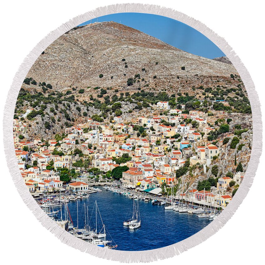Aegean Round Beach Towel featuring the photograph The port of Symi - Greece #1 by Constantinos Iliopoulos