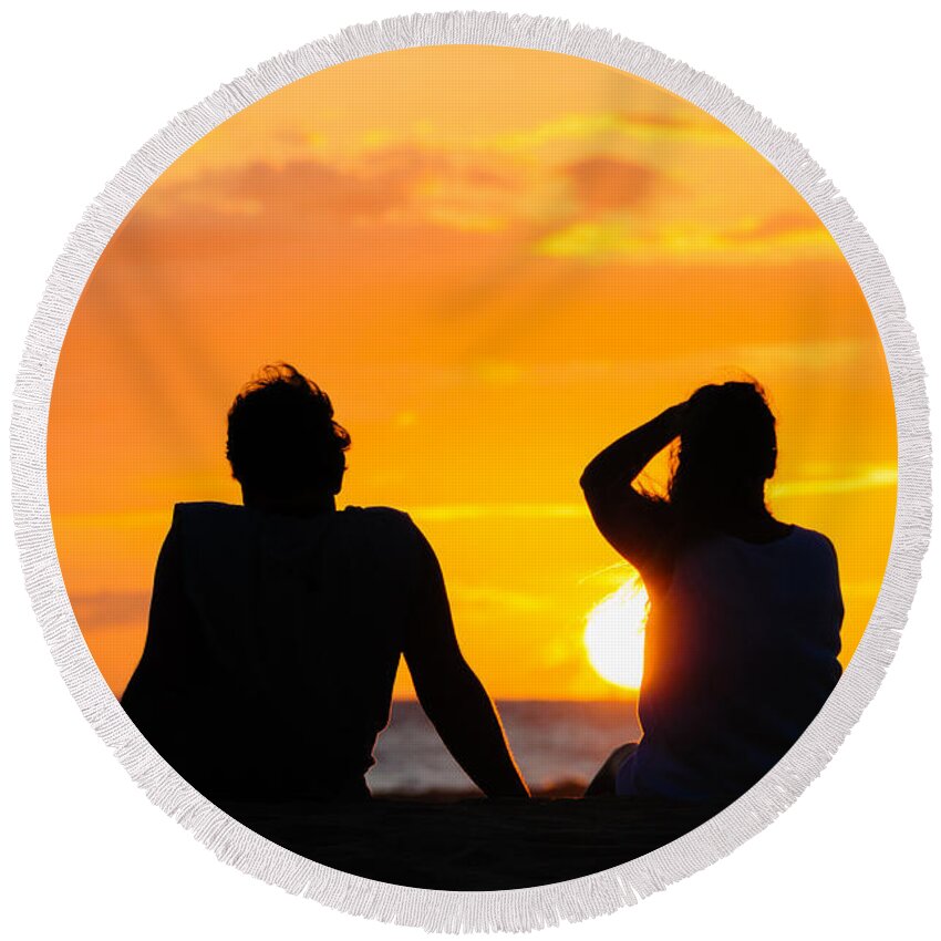 Hawaii Round Beach Towel featuring the photograph Couple watching the sunset on a beach in Maui Hawaii USA #10 by Don Landwehrle