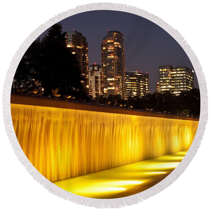 Bellevue Round Beach Towel featuring the photograph Bellevue skyline from city park with fountain and waterfall at s #14 by Jim Corwin