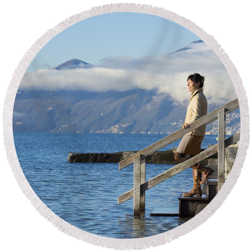 Lago Maggiore Round Beach Towel featuring the photograph Walking #4 by Mats Silvan