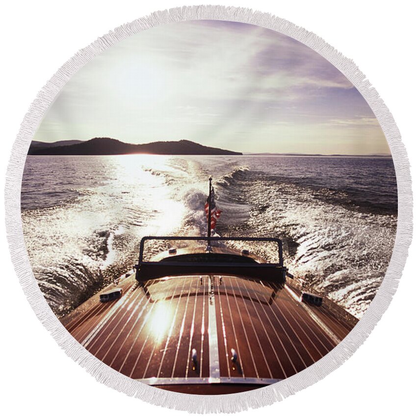 Back Lit Round Beach Towel featuring the photograph A Classic Wooden Chris-craft Two Co-pit by Dave Shafer