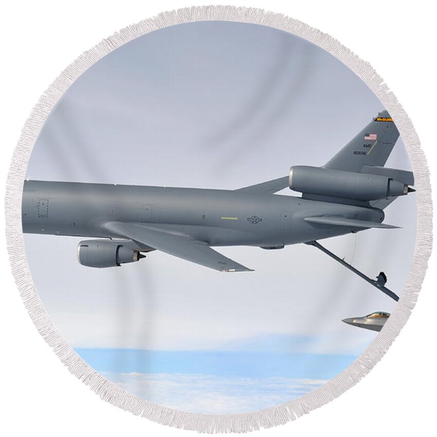 1ctcs Round Beach Towel featuring the photograph A KC-10 Extender refuels an F-22 Raptor by Celestial Images