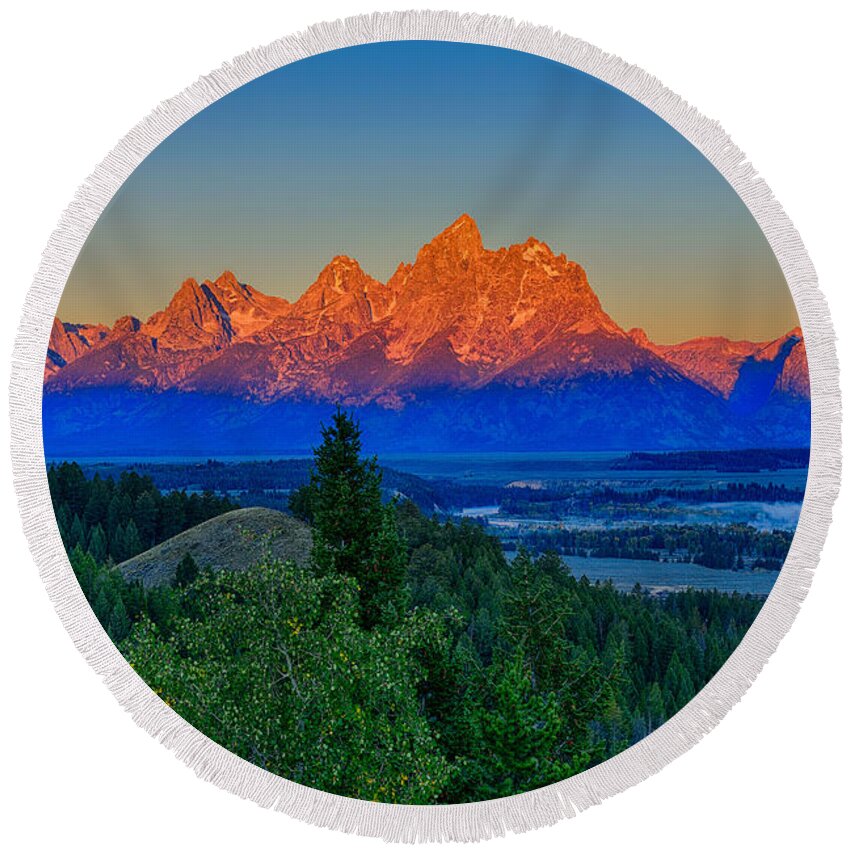 Tetons Round Beach Towel featuring the photograph Alpenglow Across The Valley by Greg Norrell