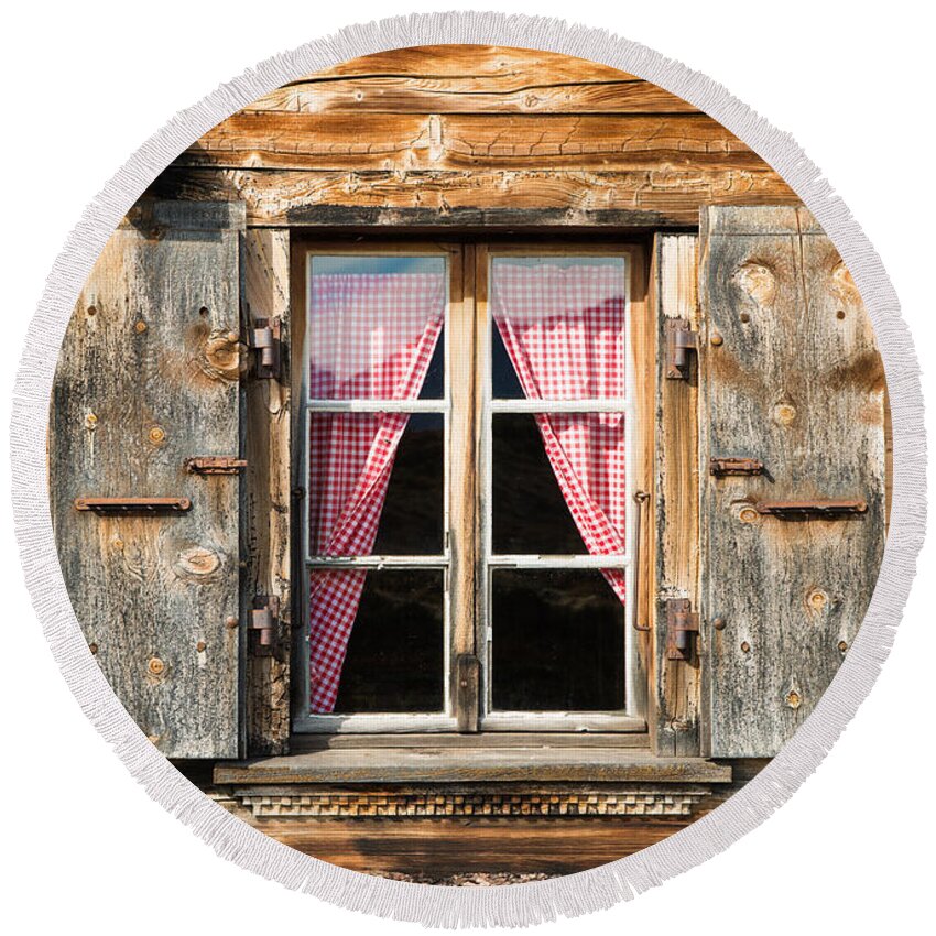 Window Round Beach Towel featuring the photograph Beautiful window wooden facade of a Chalet in Switzerland by Matthias Hauser