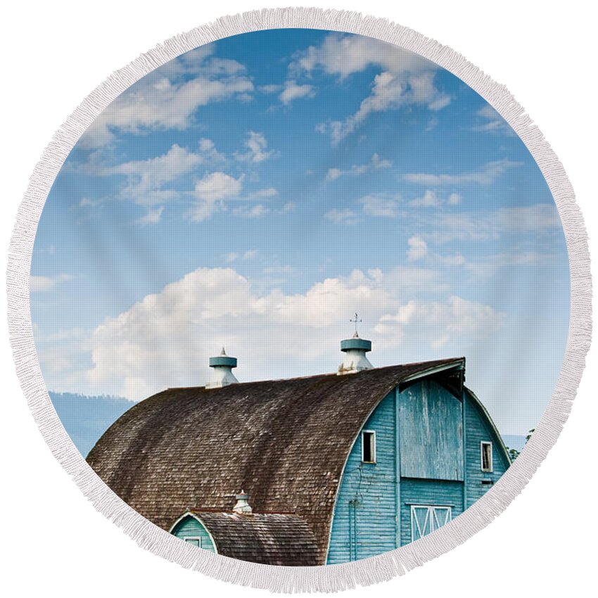 Agricultural Activity Round Beach Towel featuring the photograph Blue Barn in the Stillaguamish Valley by Jeff Goulden