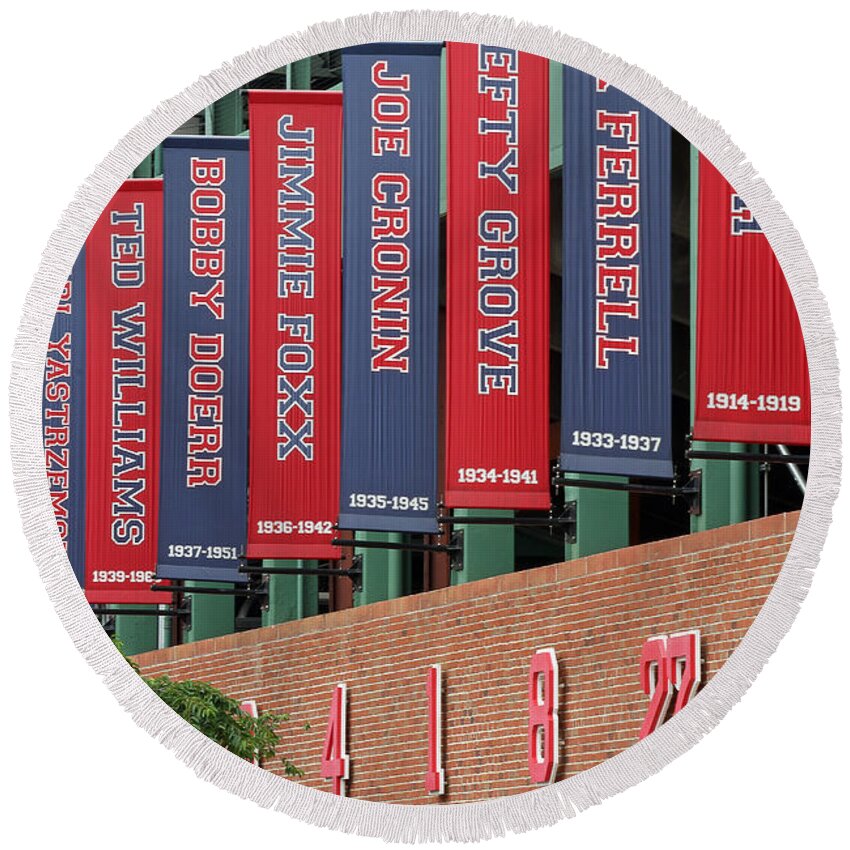 Teammates Round Beach Towel featuring the photograph Boston Red Sox Retired Numbers Along Fenway Park by Juergen Roth