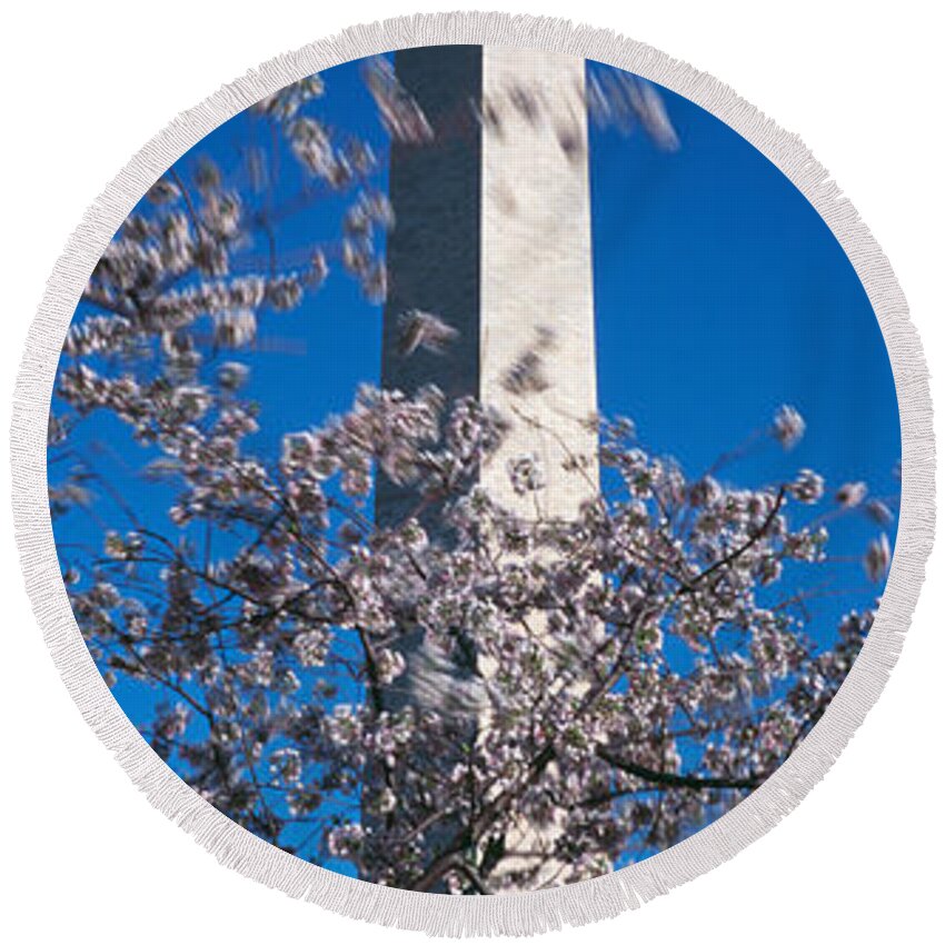 Photography Round Beach Towel featuring the photograph Cherry Blossom In Front Of An Obelisk by Panoramic Images