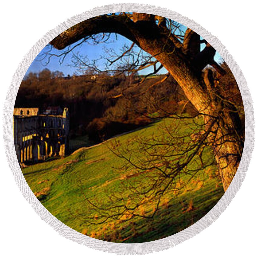 Photography Round Beach Towel featuring the photograph Church On A Landscape, Rievaulx Abbey by Panoramic Images