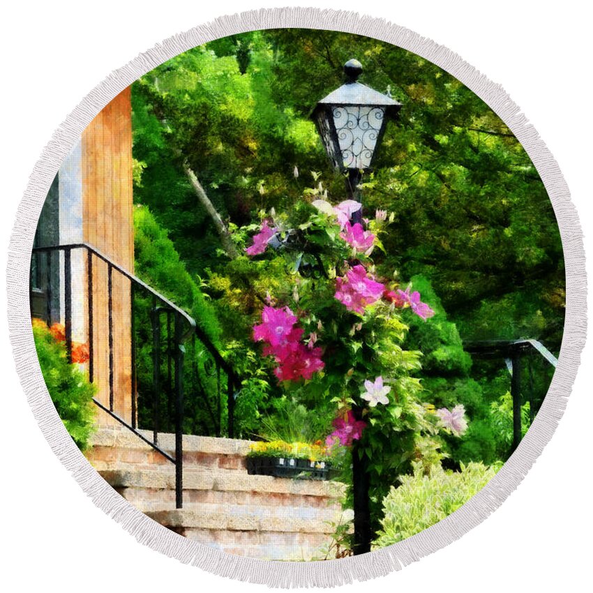 Lamp Post Round Beach Towel featuring the photograph Clematis on a Lamp Post by Susan Savad